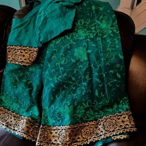 Dark green black gold saree